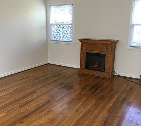 living room with electric FP w/heater