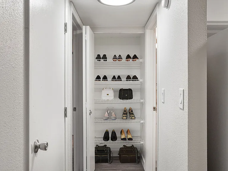 A linen closet at Horizon East Apartments