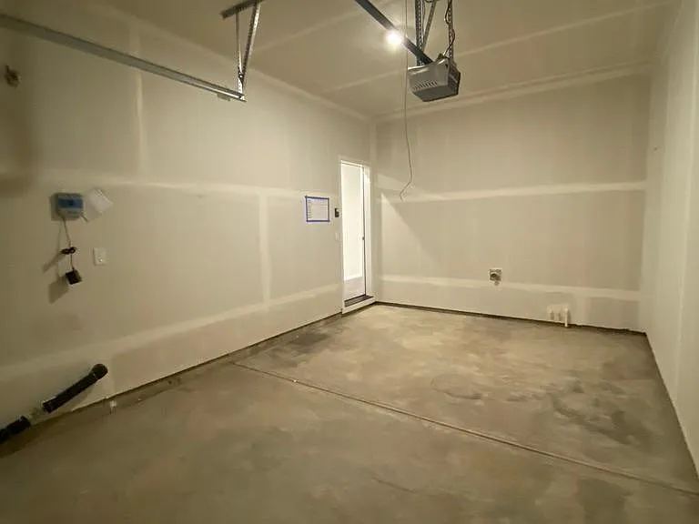 Single car garage with electric door opener. The driveway allows for extra parking.