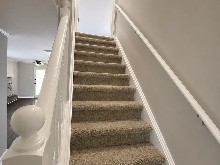 Stairs to second floor bedroom