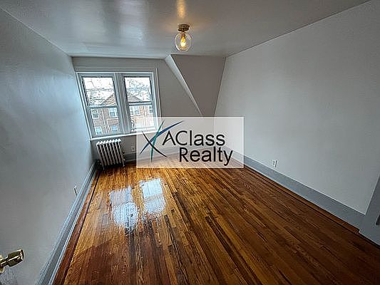 4th image of 33-38 72nd St #C2