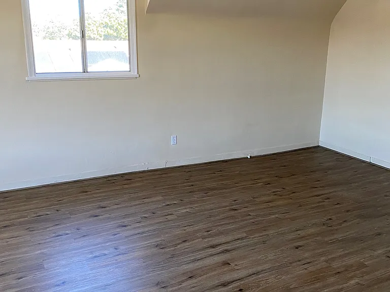 Spacious living room/dining area.