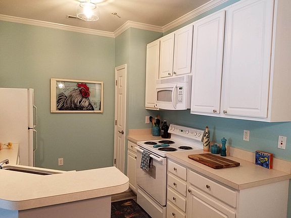 Kitchen area with all appliances and pantry