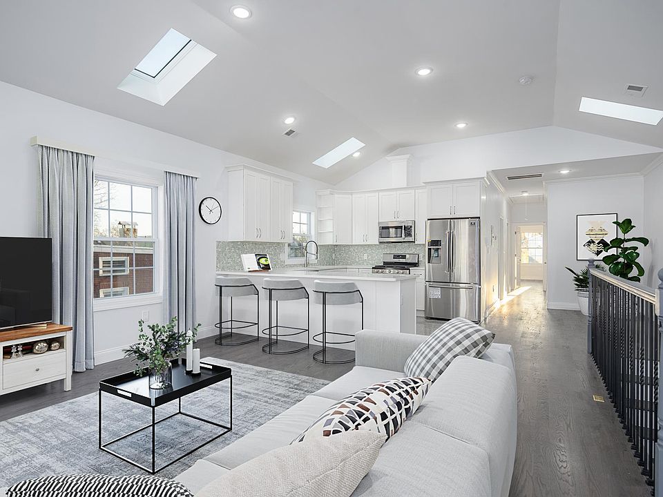 Open concept Kitchen & Living Room *virtually staged for illustrative purposes ONLY*