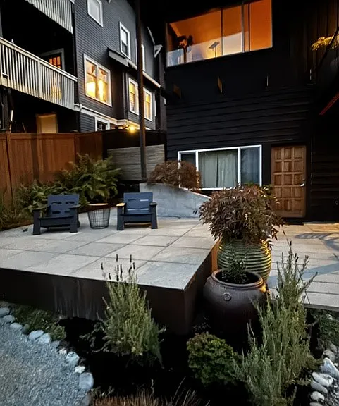 Raised patio with comfortable Loll armchairs for you to enjoy and take in the view