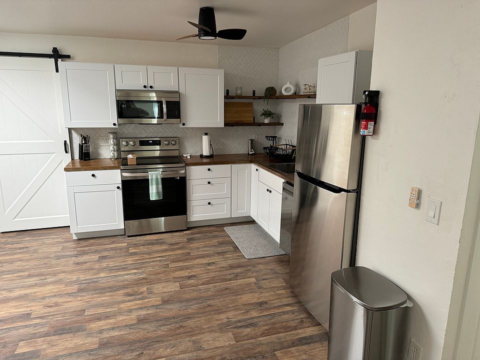 Brand New (Fully Stocked) Kitchen with new stainless steel appliances.