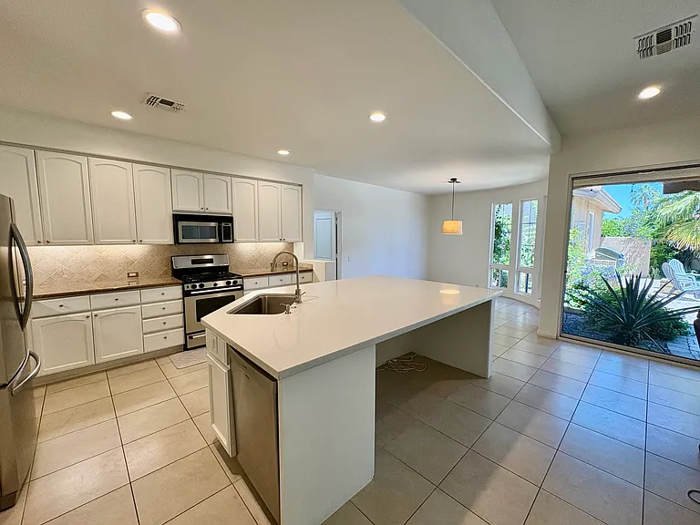 SPACIOUS KITCHEN OPEN TO GREAT ROOM