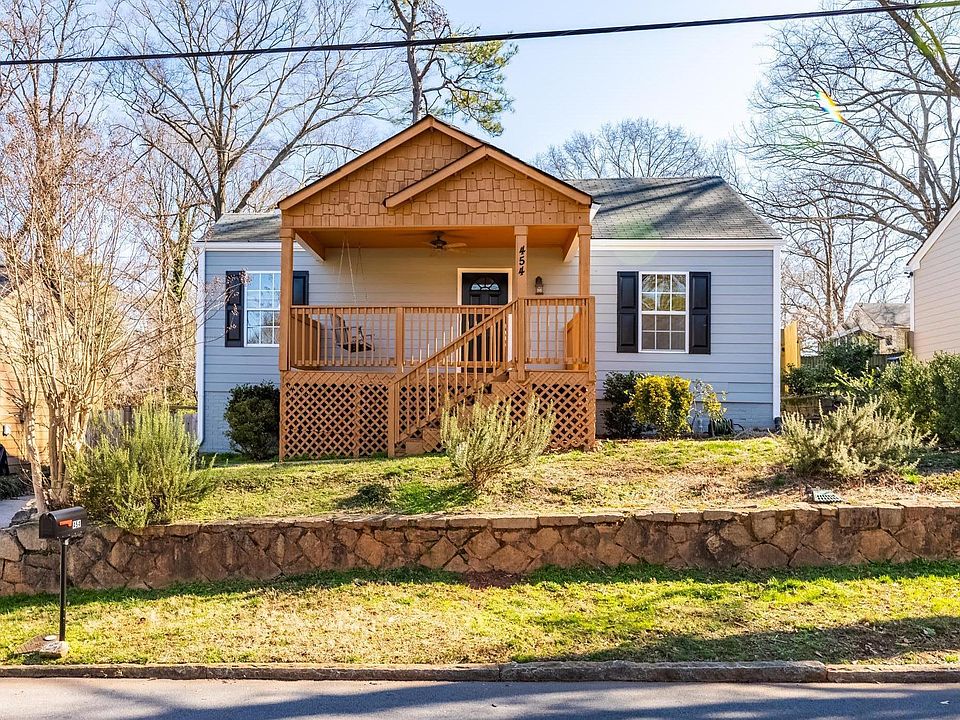 Welcome to 454 Pasley Ave! The peaceful front porch over looks the front yard-- the previous residents grew pumpkins, tomatoes, and herbs. Enjoy the lovely views from the porch swing.