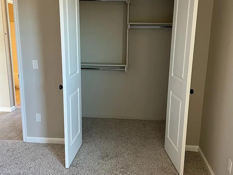 Inside of one of the guest bedroom closets