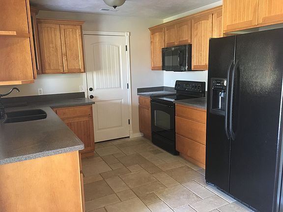 Kitchen and door going to garage