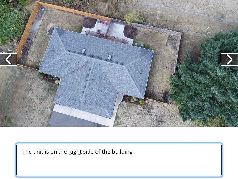 The unit is to the right side of the building.