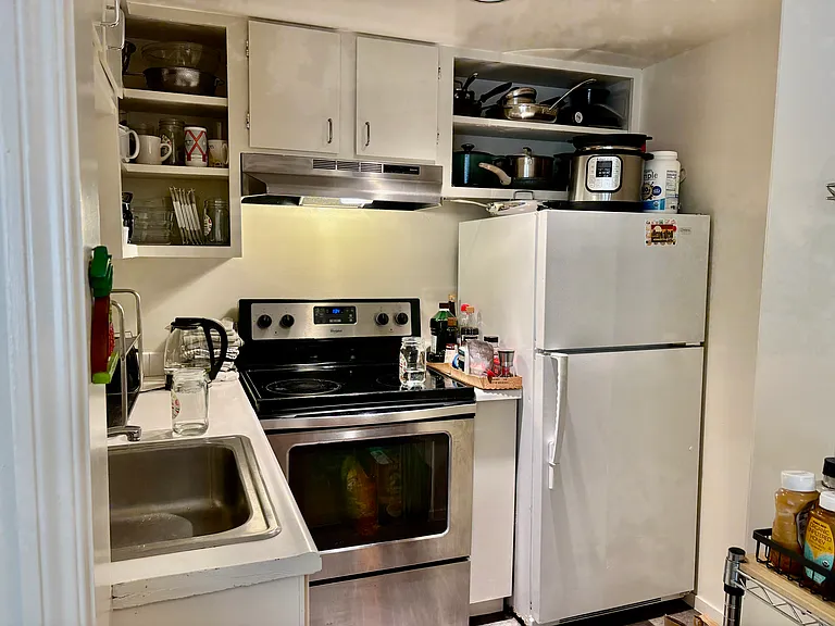 Compact but efficient kitchen off main living room