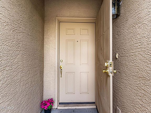 Front Door showing lockable security/screen door