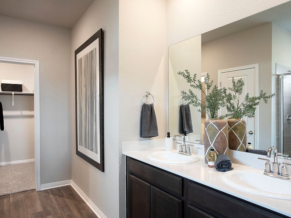 Take advantage of the spa-like primary bathroom at the end of a long day.