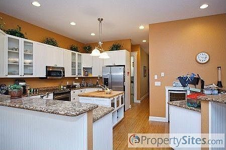 5th image of 5006 W Longfellow Ave