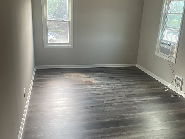 Large bedroom 2 of 2 with new luxury vinyl plank