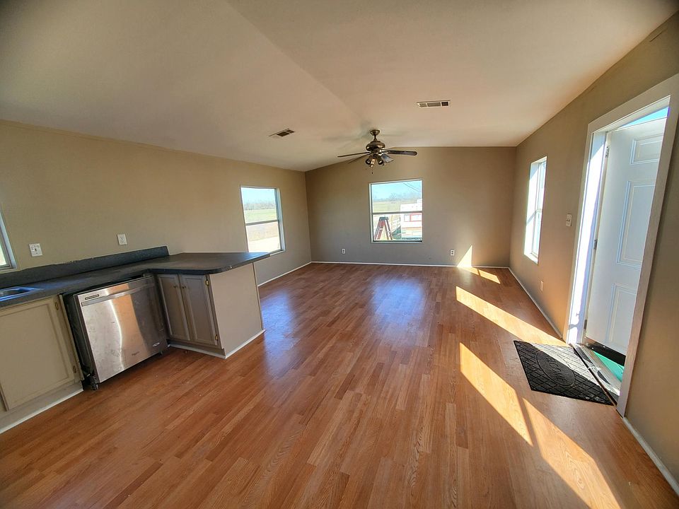 Living room / partial kitchen view