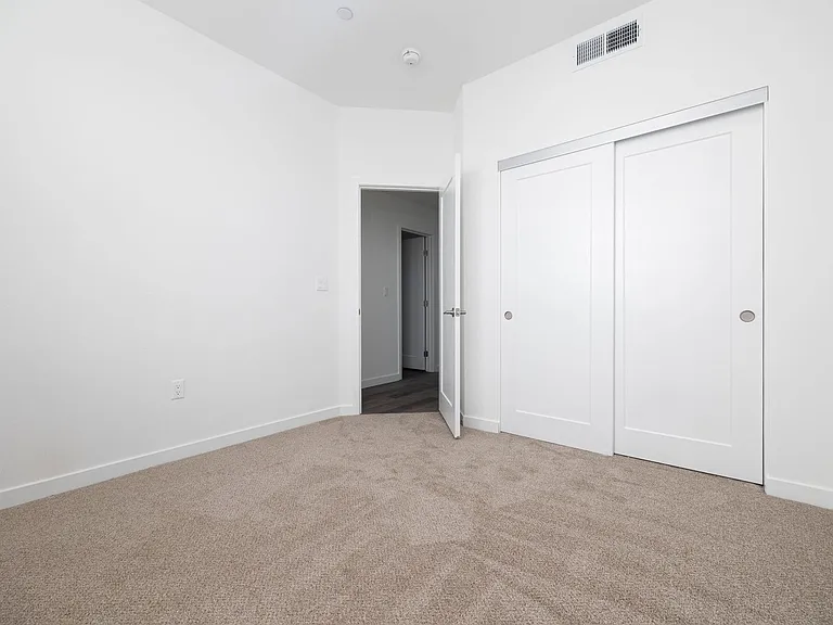 341 E 30th St E — Photo 17