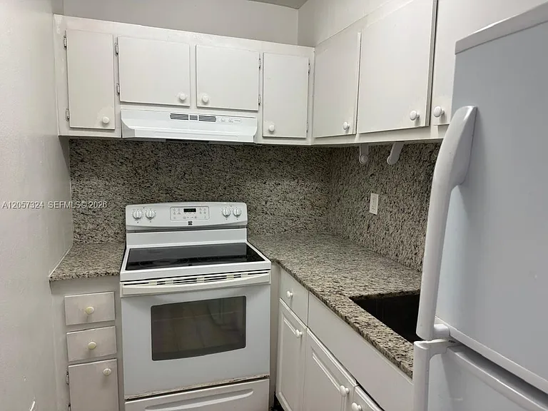 4725 NW 7th St #206-3 — Photo 1