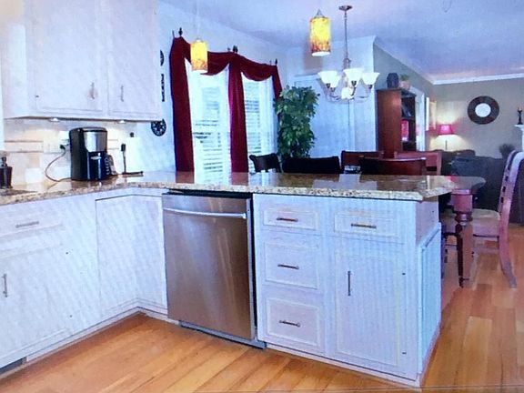 Kitchen, breakfast nook and den.
