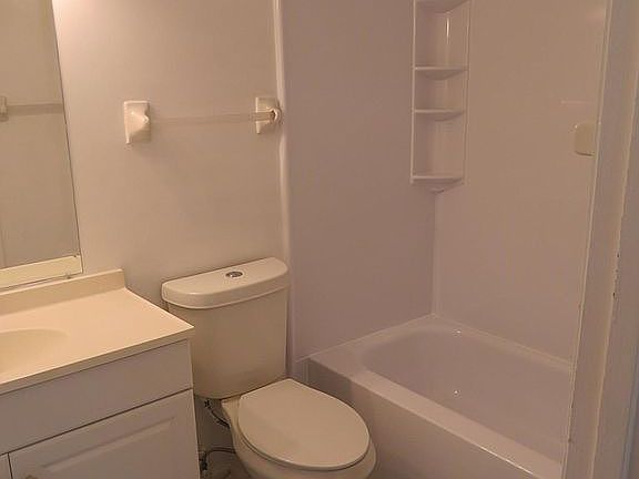 New bath, toilet, mirror
