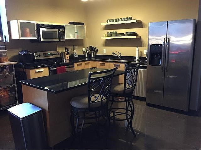 Eat in kitchen with ss appliances and granite counters!