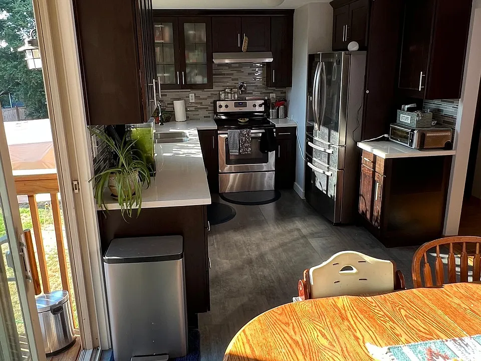 Your dining area will fits a 6 person table.