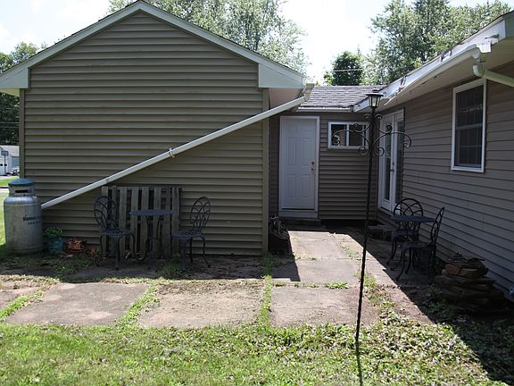 Back patio and french doors. Other door leads to mud room.