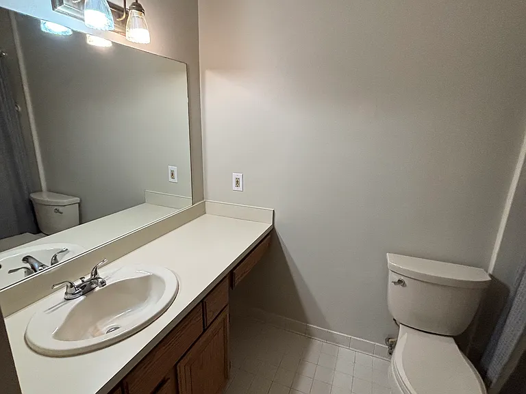 Bath with vanity sitting area