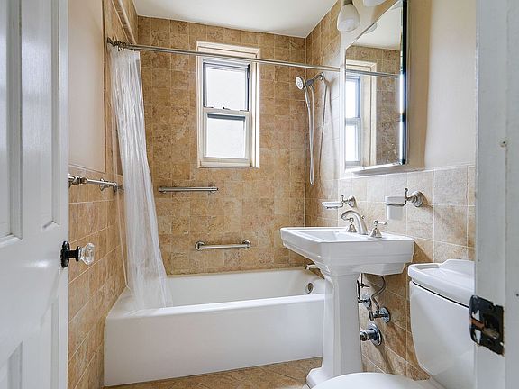 5th image of 5614 Netherland Ave APT 4E