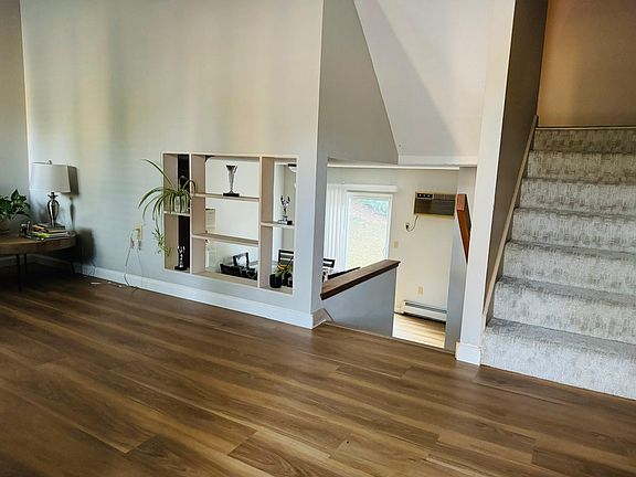 Living room down to kitchen and up to bedrooms