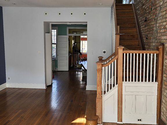 Living room looking towards dining room and kitchen.