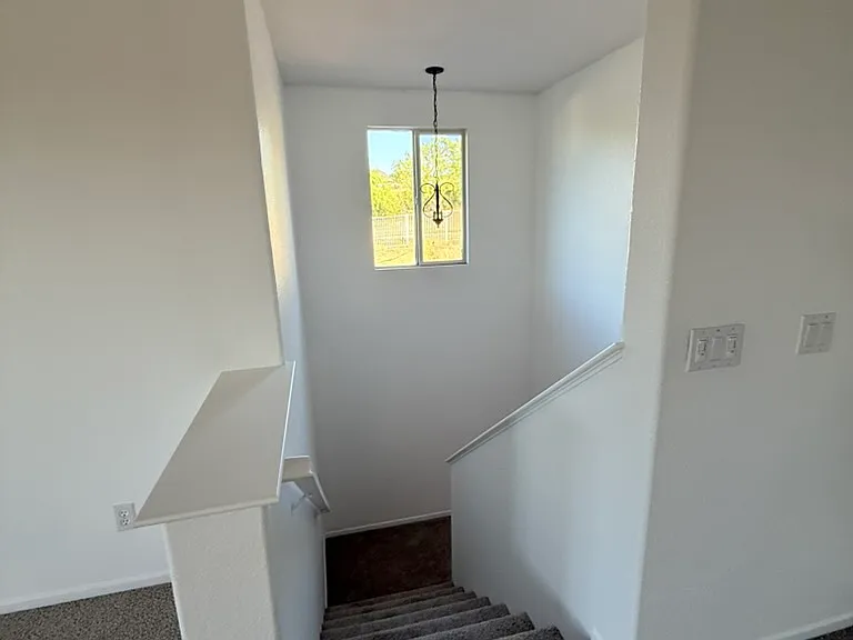 Upstairs loft, looking down stairs.