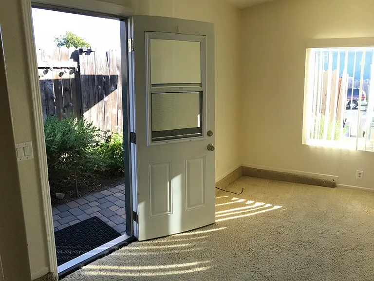 Entry door with venting window.
*All flooring has been upgraded to wood plank.*