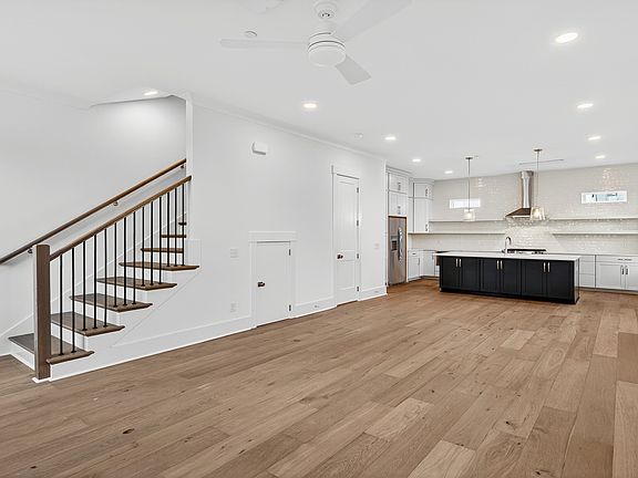 Spacious living room in the Seabrook home plan with open-concept design and natural light.