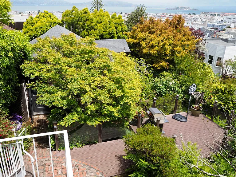 View of the garden and cottage and deck