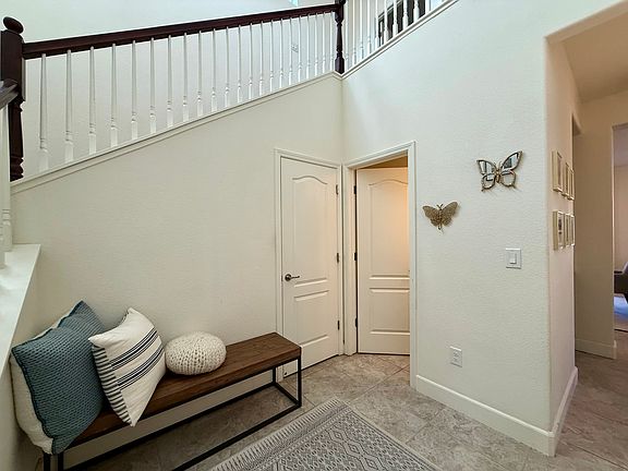 Front entry hall - closet under stairs & half bathroom