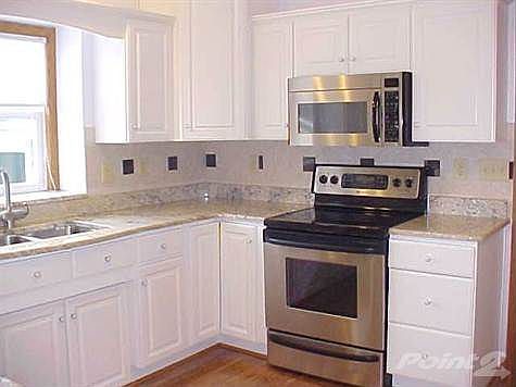 Granite counters, beautiful white cabinetry