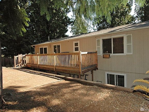 A big back deck and terraced yard offer multiple areas for entertainment or R&R! 