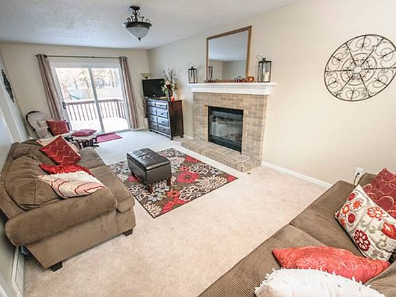 Sliding glass doors lead to the back yard deck area off the living room.