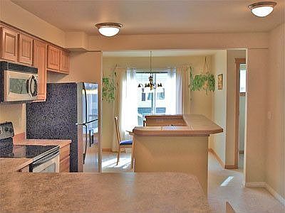 view across kitchen to dining area