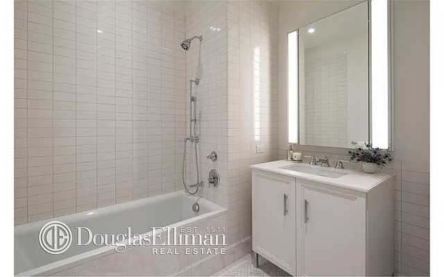 Sold by Douglas Elliman | media 13