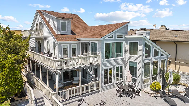 Winter Rental - 7BR Bayfront Escape w/ Heated Pool, Game Room, Balconies & Stunning Water Views — Photo 4