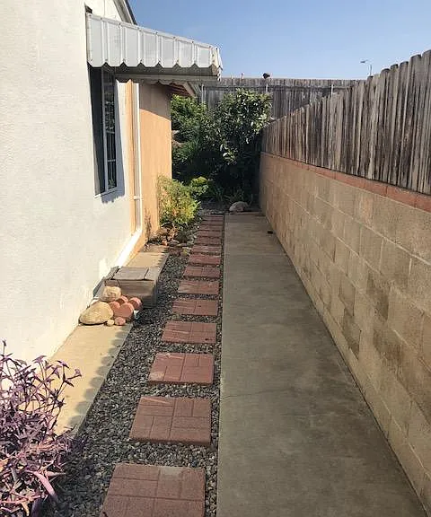 Side Entrance to back unit and exclusive use fenced yard