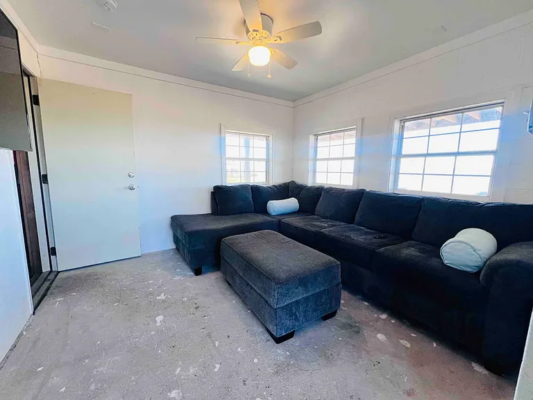 Rustic downstairs TV room
