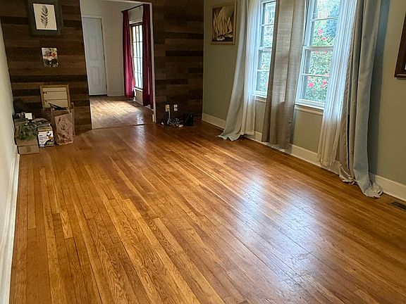 Front room for dining room table. Also used as office previously.