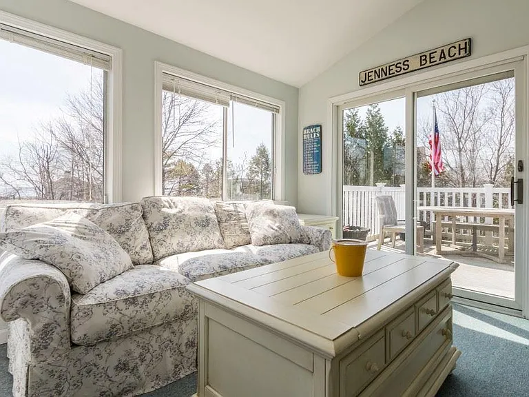 Three season, ocean-view sunroom with private deck directly off of it