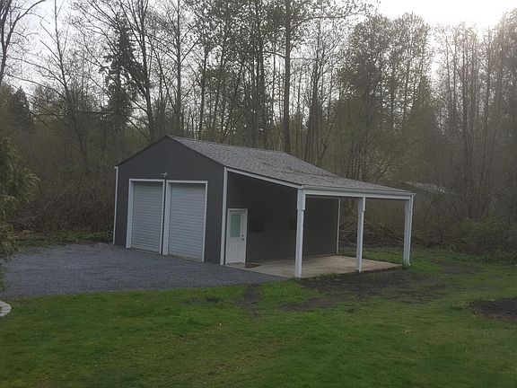 576 sf 2 story- double car garage/shop with 228 sf attached carport