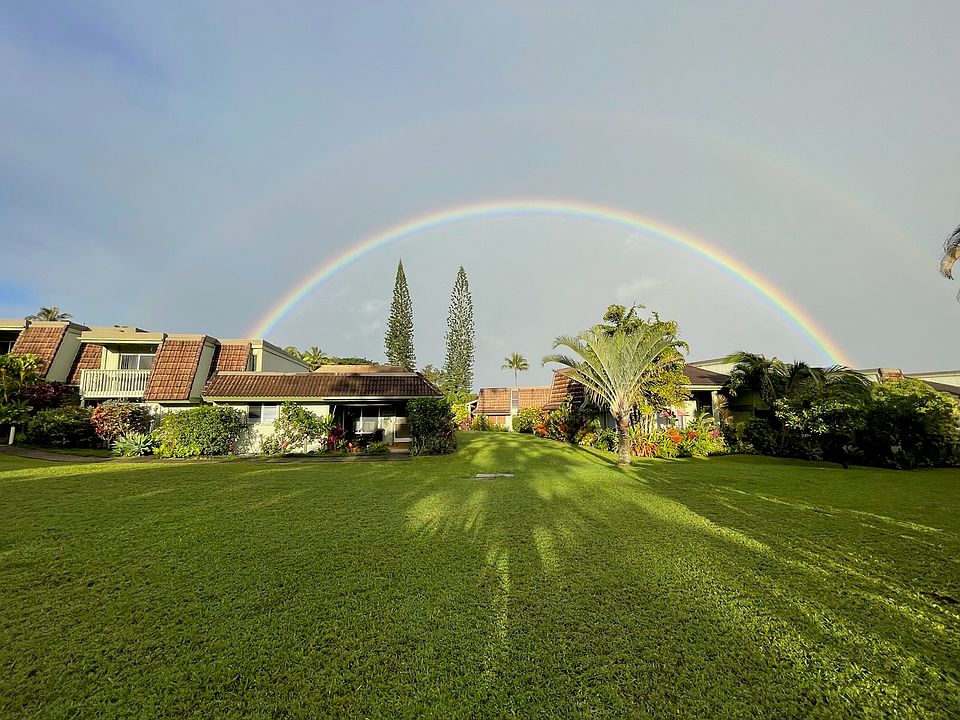 Enjoy tropical surroundings, birds and beautiful flowers. This is the view from the front of our beautiful villa. You will be pleased to have wide open spaces as this is an end unit with 2 lanais and plenty of room. This is a 1 story villa and NO stairs .