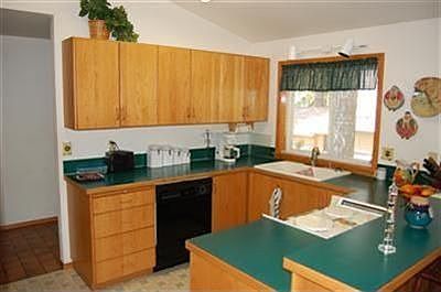 Plentiful counter space matches the golf course beyond